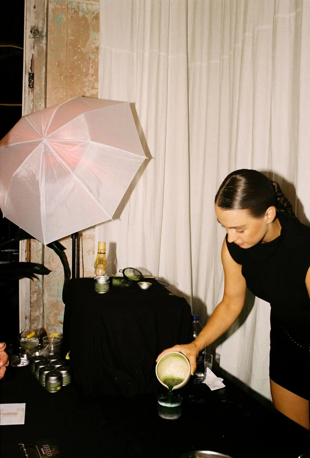 Pouring fresh matcha at an Efflo matcha bar